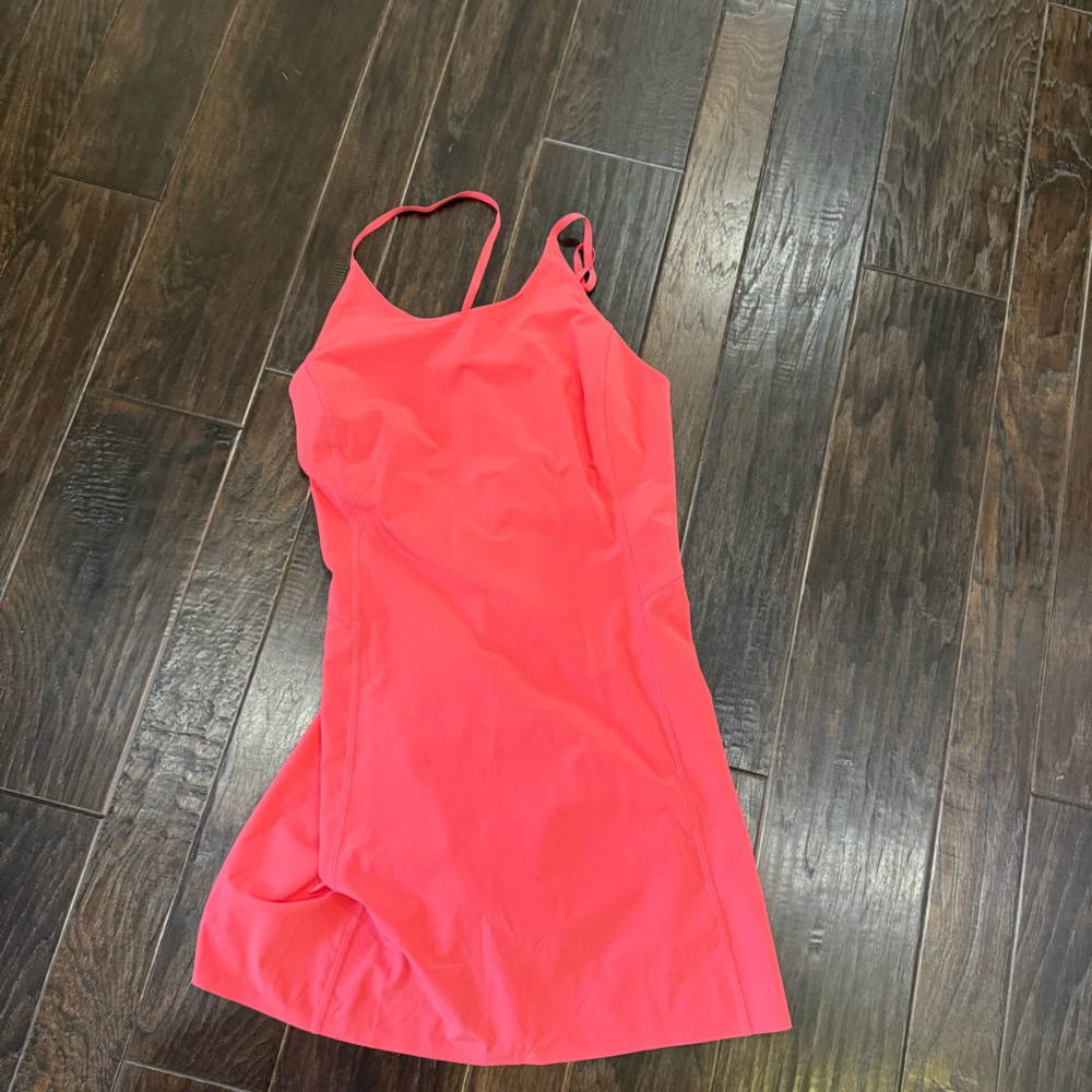 Athleta coral tennis dress with built in shorts/bodysuit.